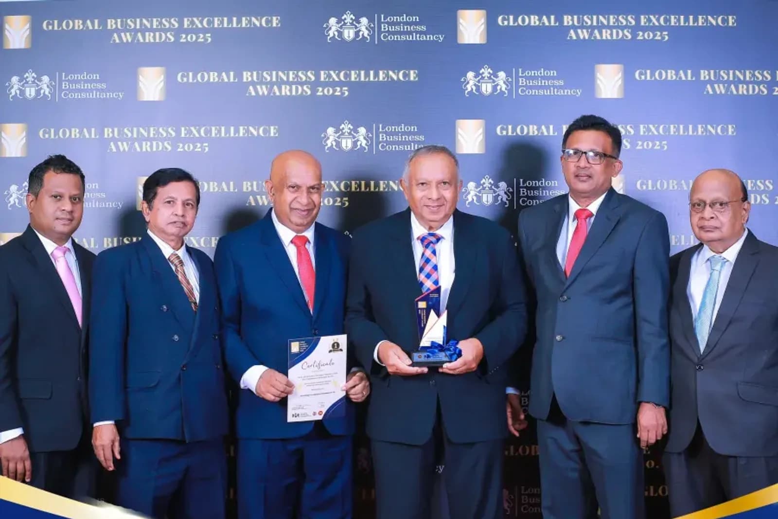 Global Business Excellence Awards leadership recognition on stage