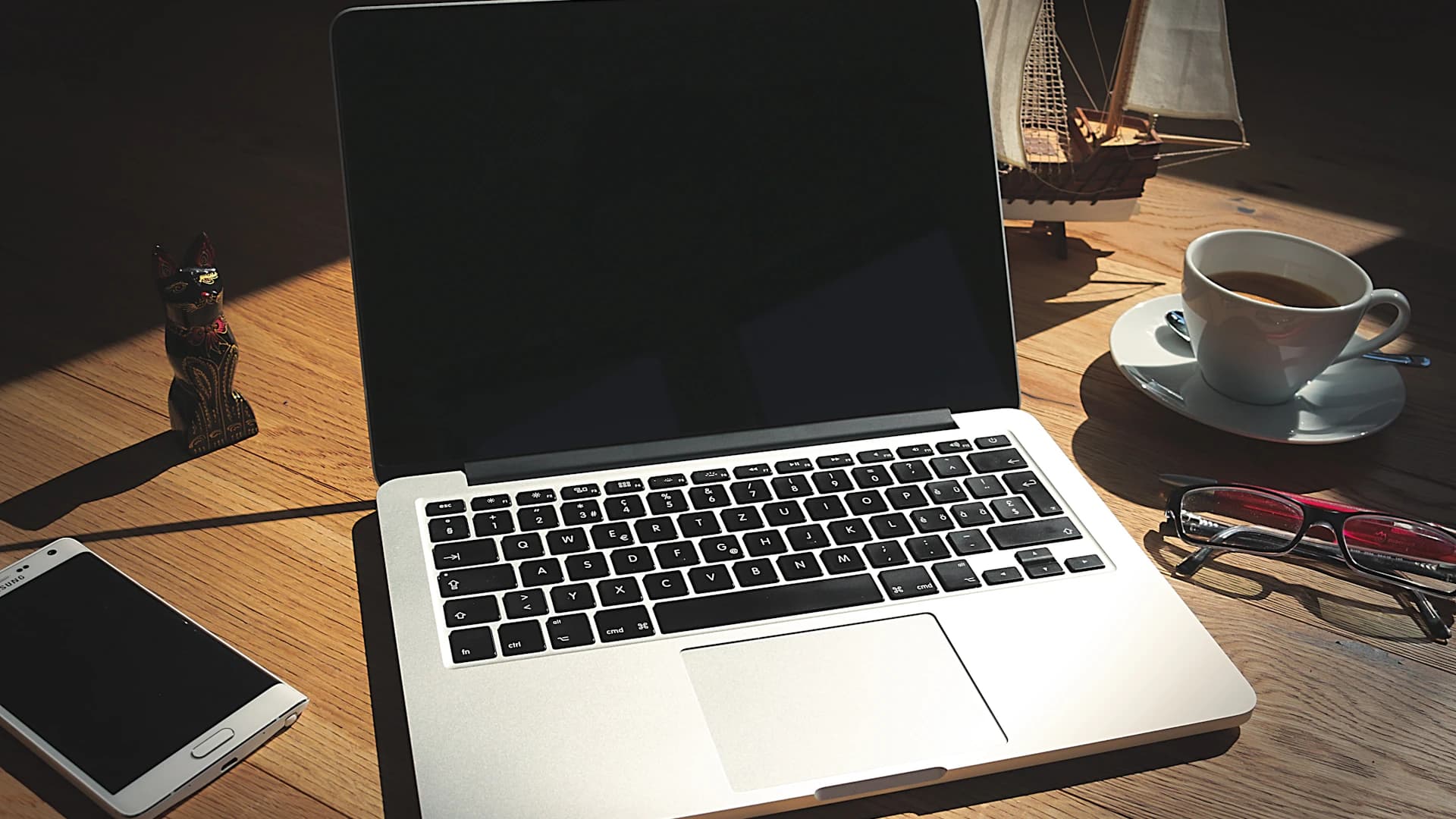 A laptop representing website preferences and cookie controls