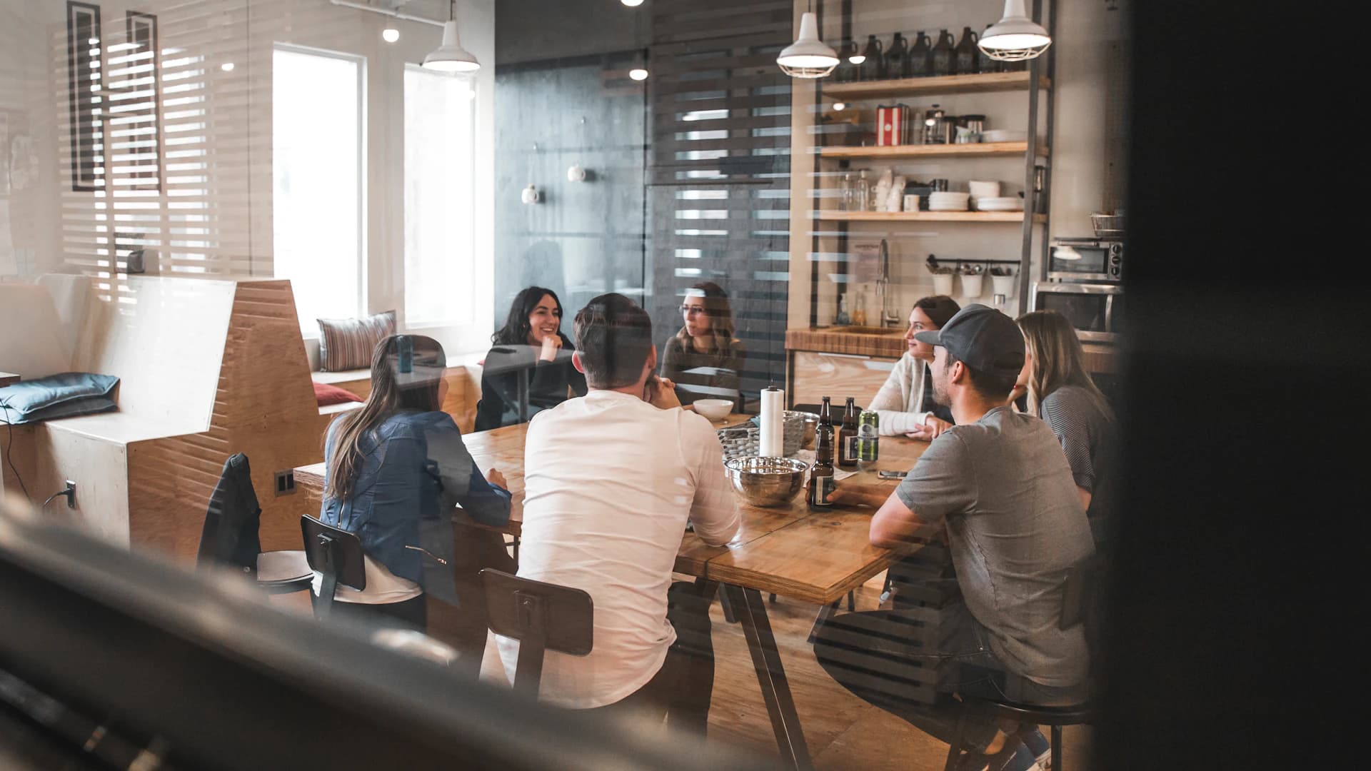 Colleagues connecting around a shared table at work