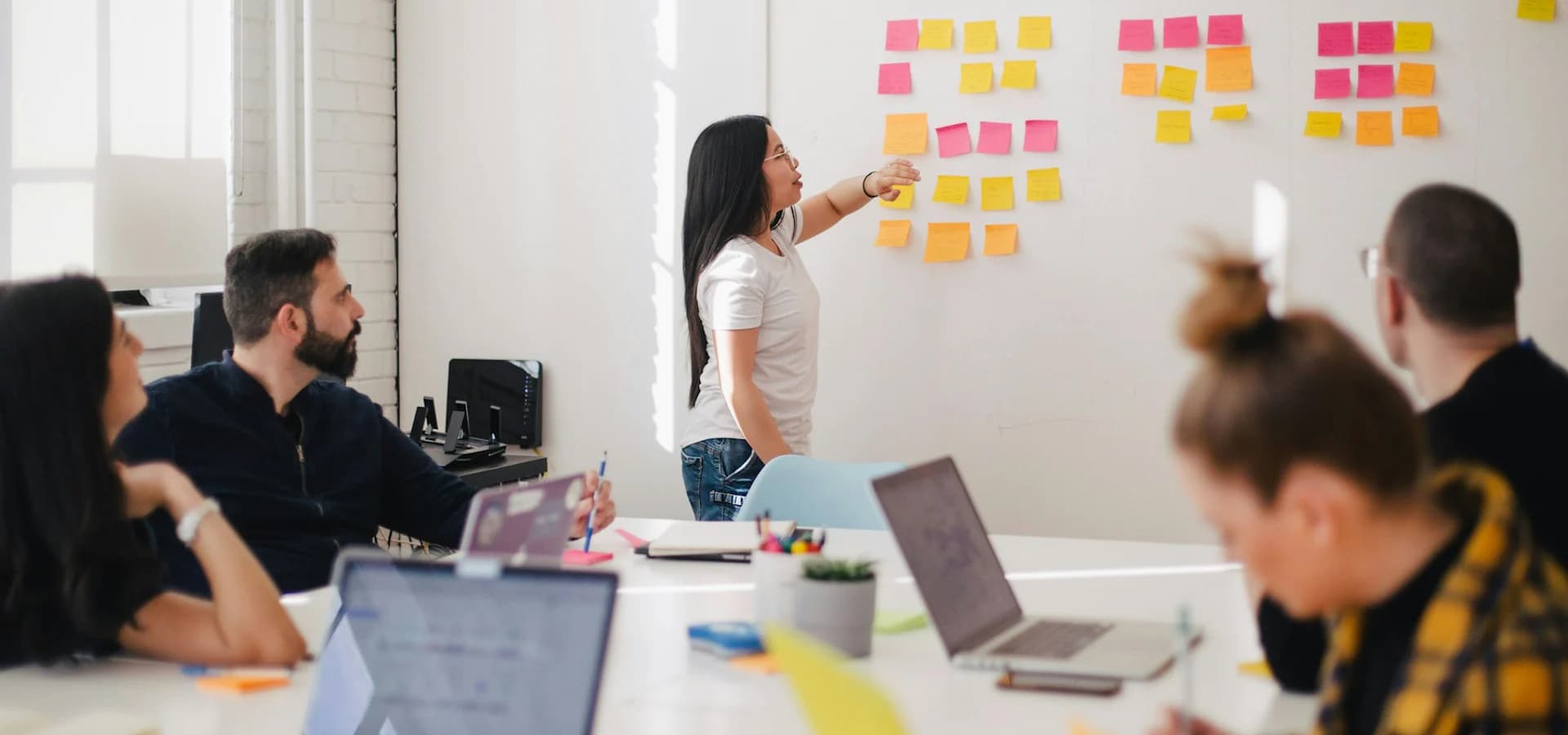 A team planning strategy with notes and ideas
