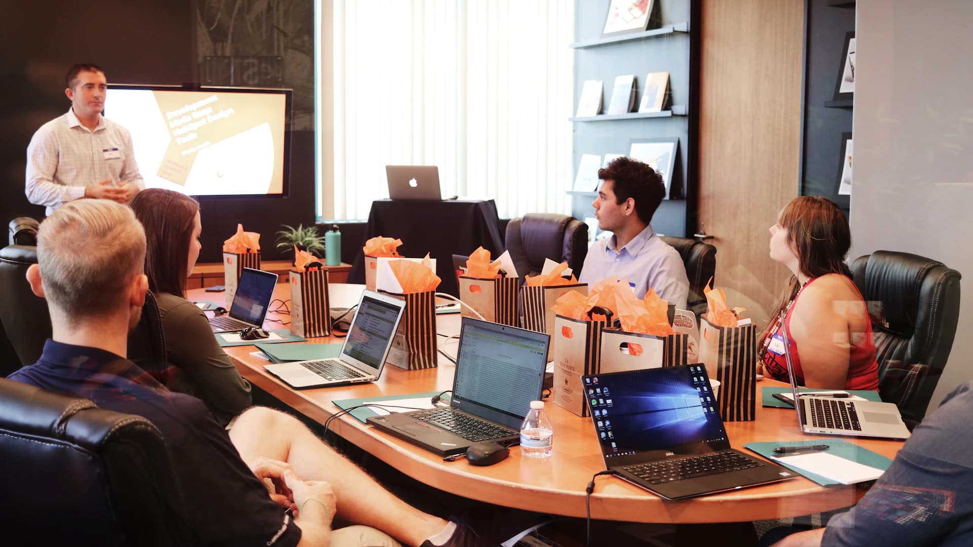 A business leader presenting a shared mission to colleagues
