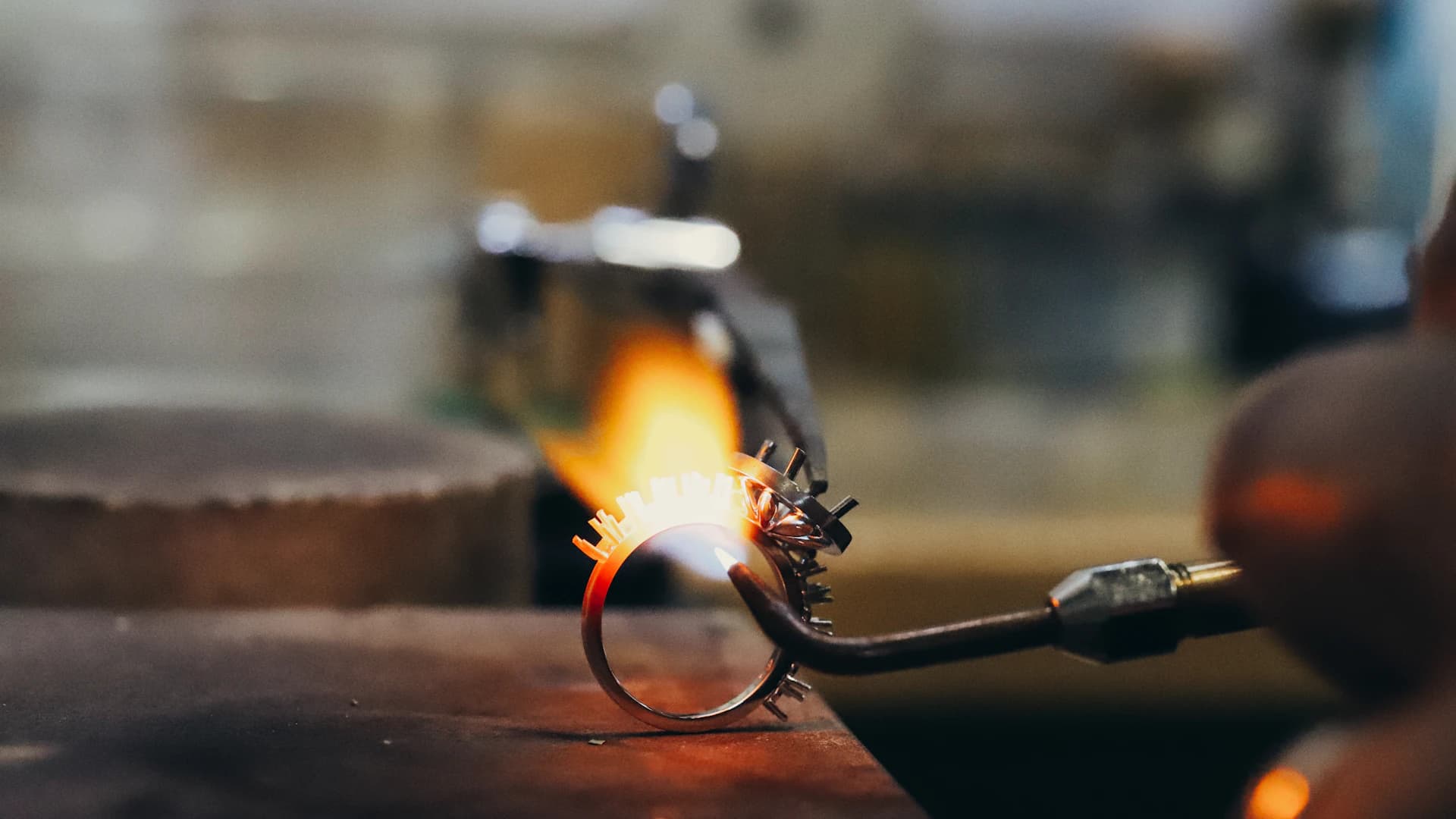 A jeweller crafting a fine ring by hand