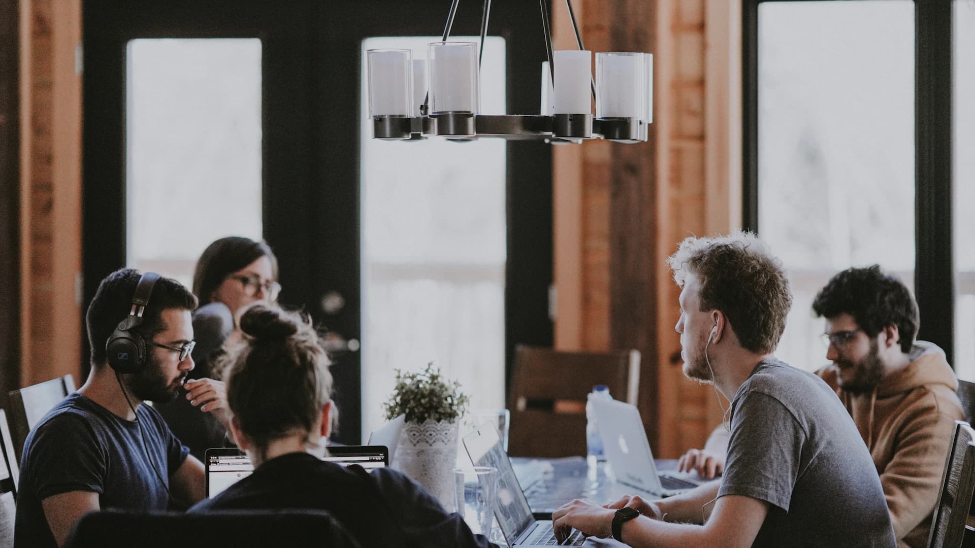 Colleagues collaborating in a modern workspace