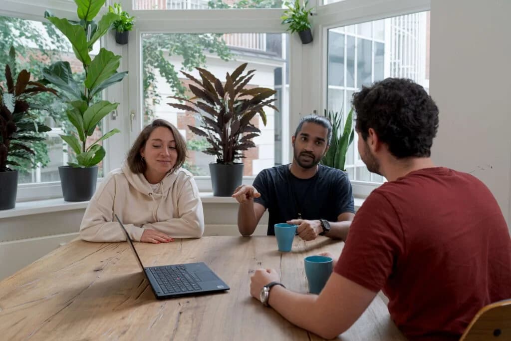 London Business Consultancy team collaborating in a bright office